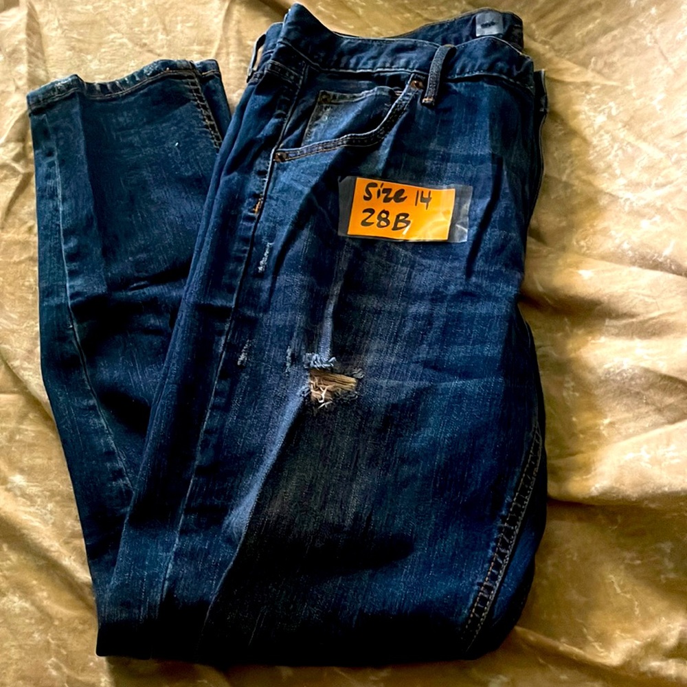 Dark blue stretchy jeans.